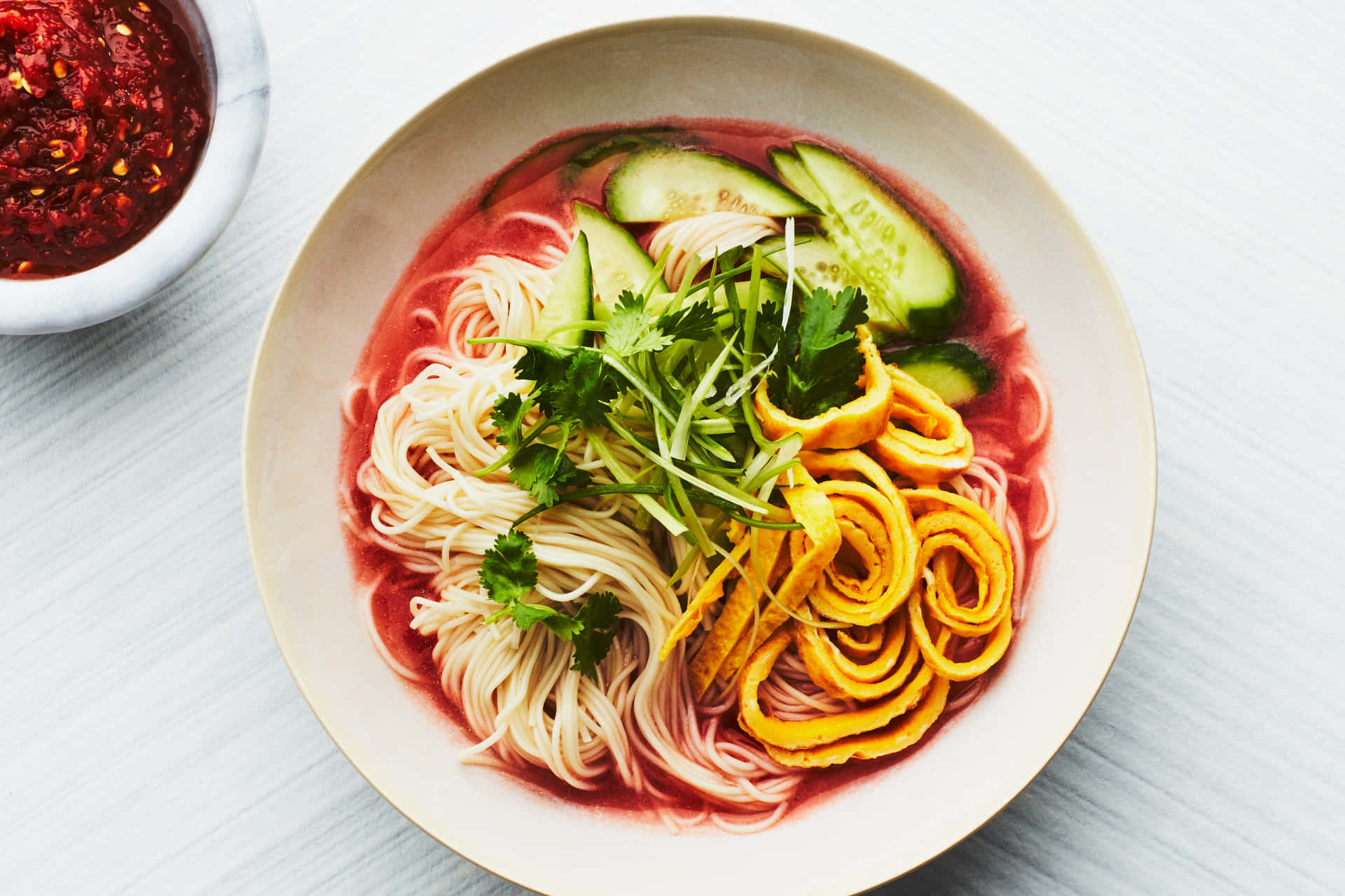 Delicious Noodles Served in Chilled Tomato Broth Wallpaper