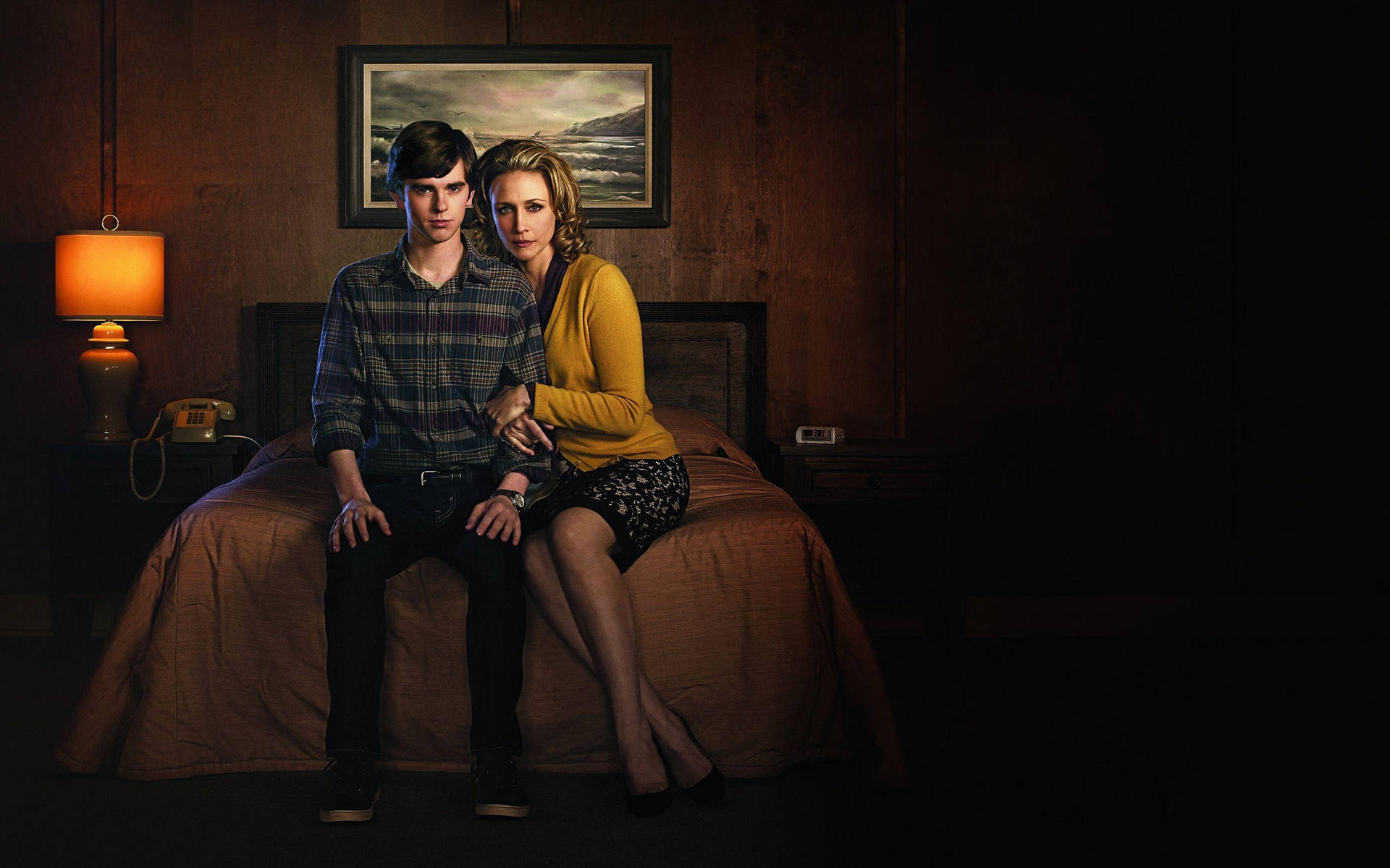 Norma And Norman Sitting In Bates Motel Room Wallpaper