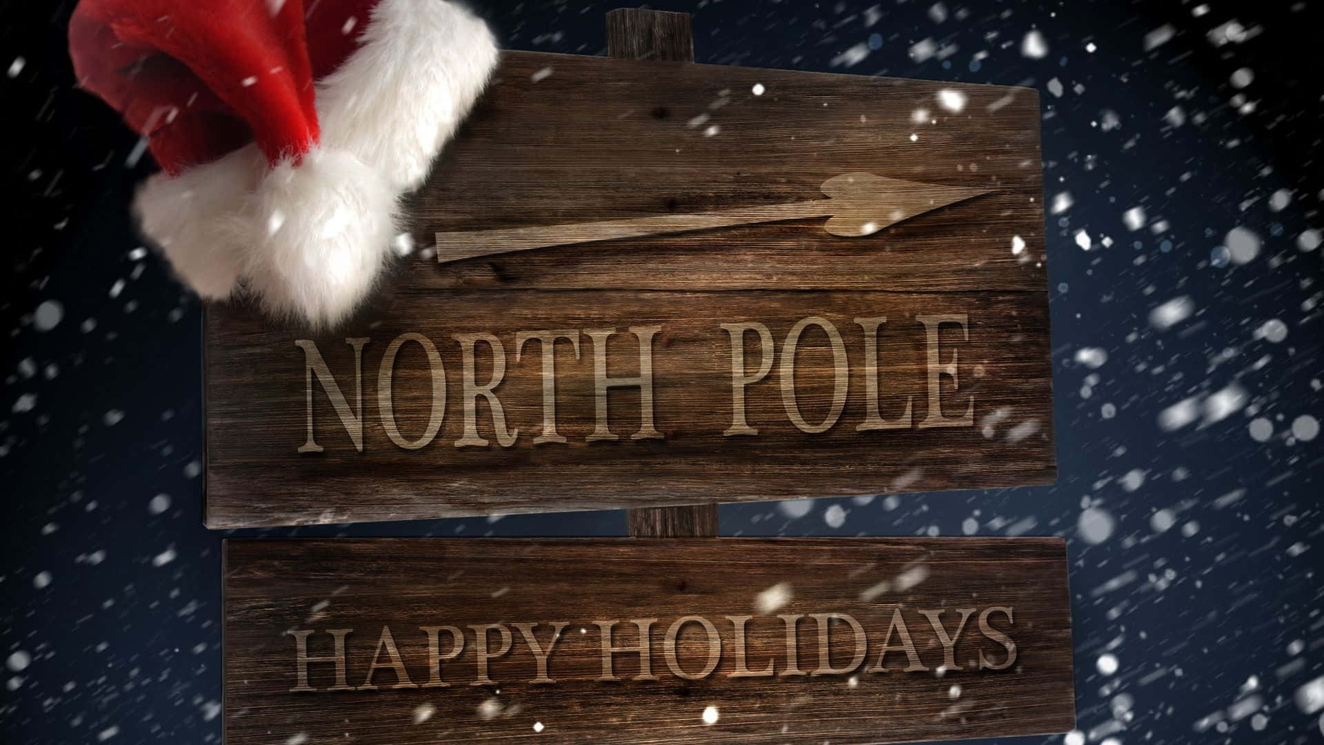 Wooden North Pole Sign With A Santa Hat Picture