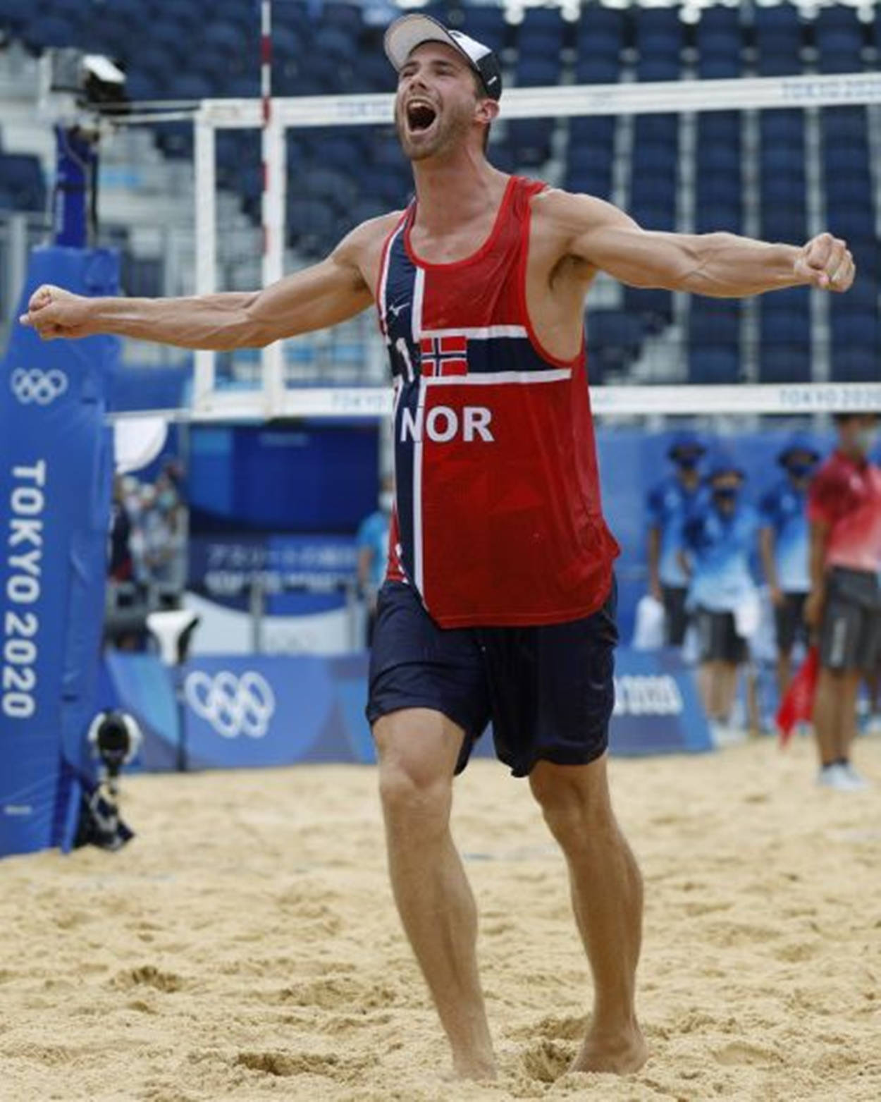 Electrifying Action - Anders Mol of Norway at the Tokyo 2020 Olympics Beach Volleyball Competition Wallpaper