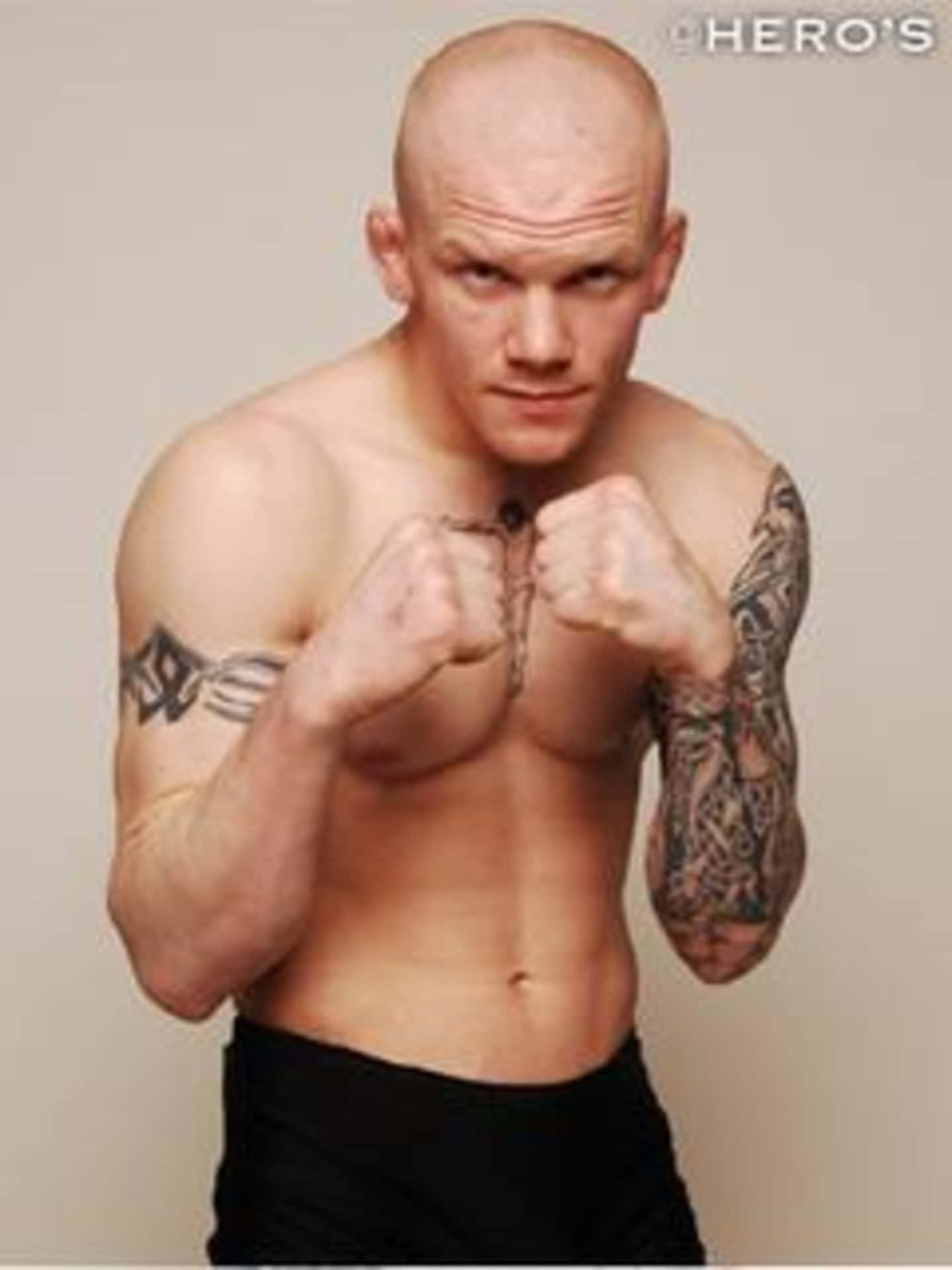 Intense Fighting Pose of Norwegian Mixed Martial Artist Joachim Hansen Wallpaper