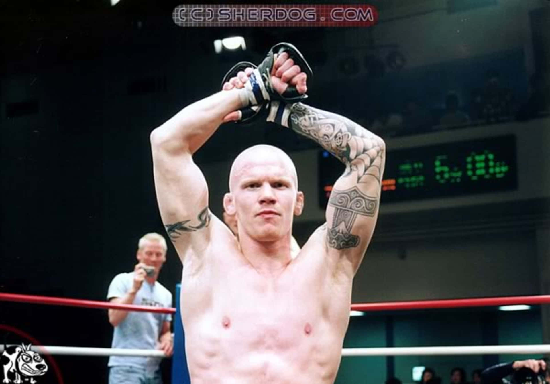 Norwegian MMA Joachim Hansen Hands Crossed Above His Head Wallpaper