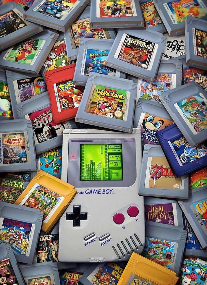 A Game Boy Is Surrounded By Many Different Games