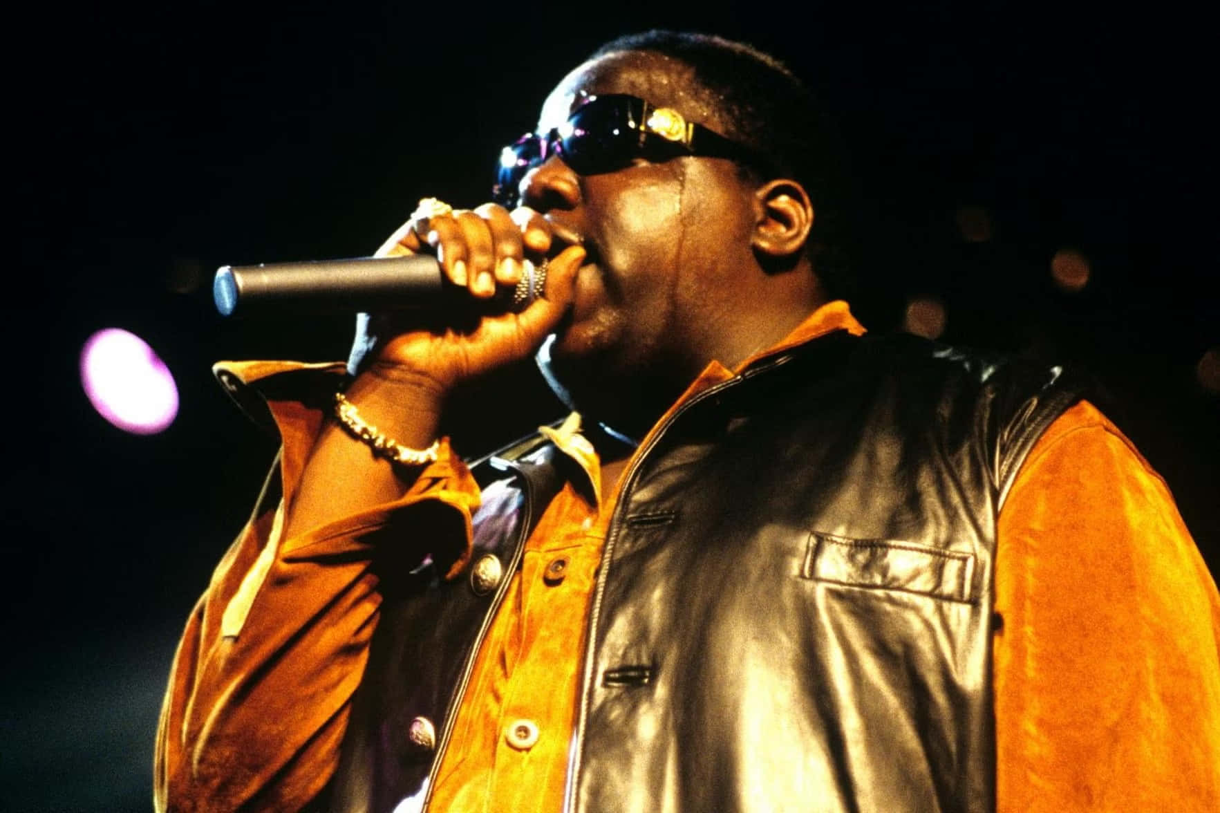 Notorious B I G Performingon Stage Wallpaper