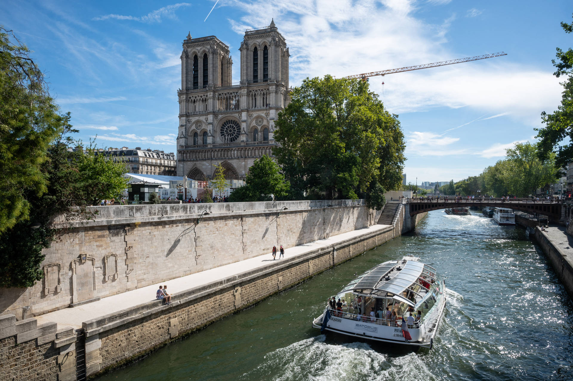 Notre Dame And Seine Boat Wallpaper