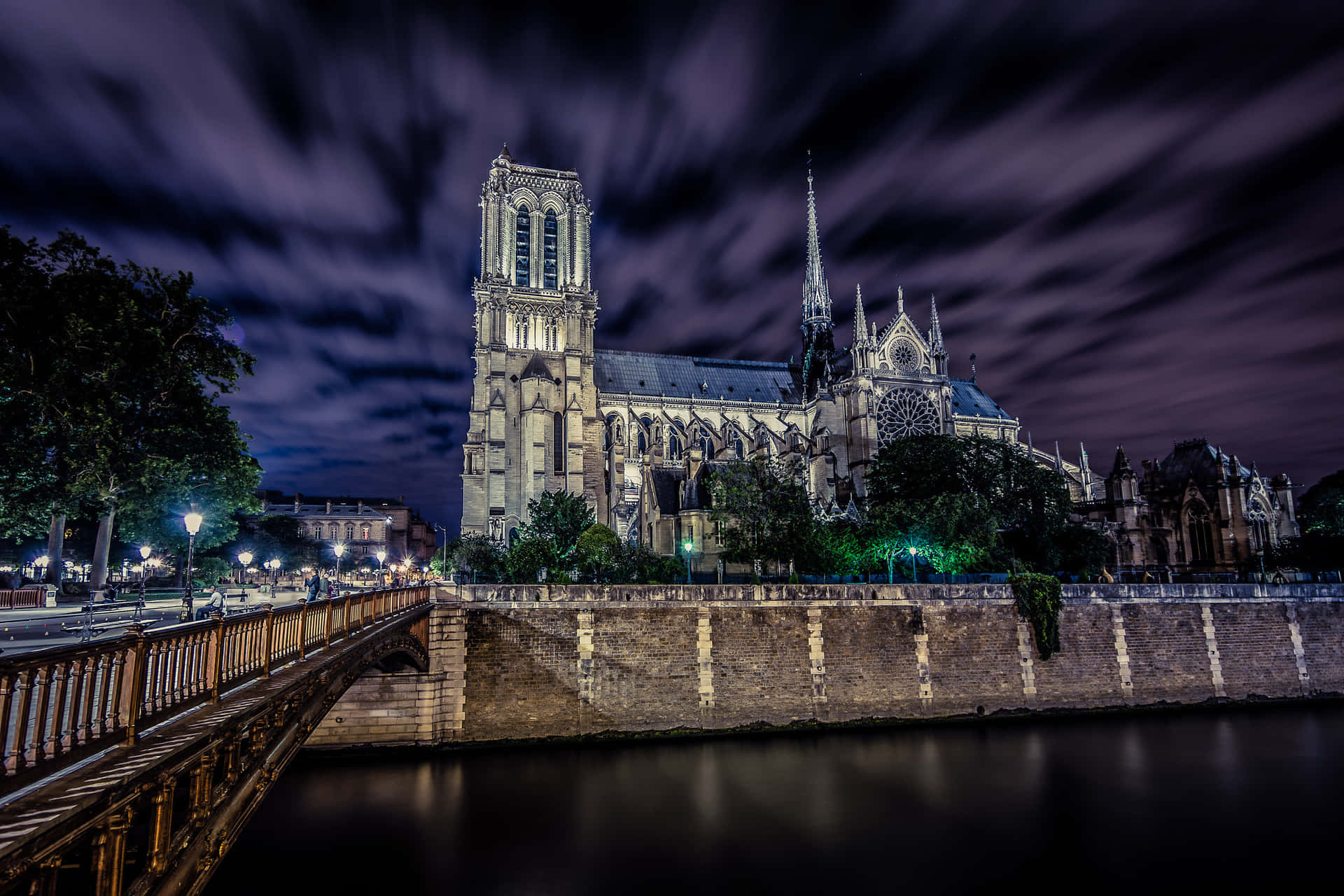 Notre Dame Cathedral Under The Dark Clouds Wallpaper