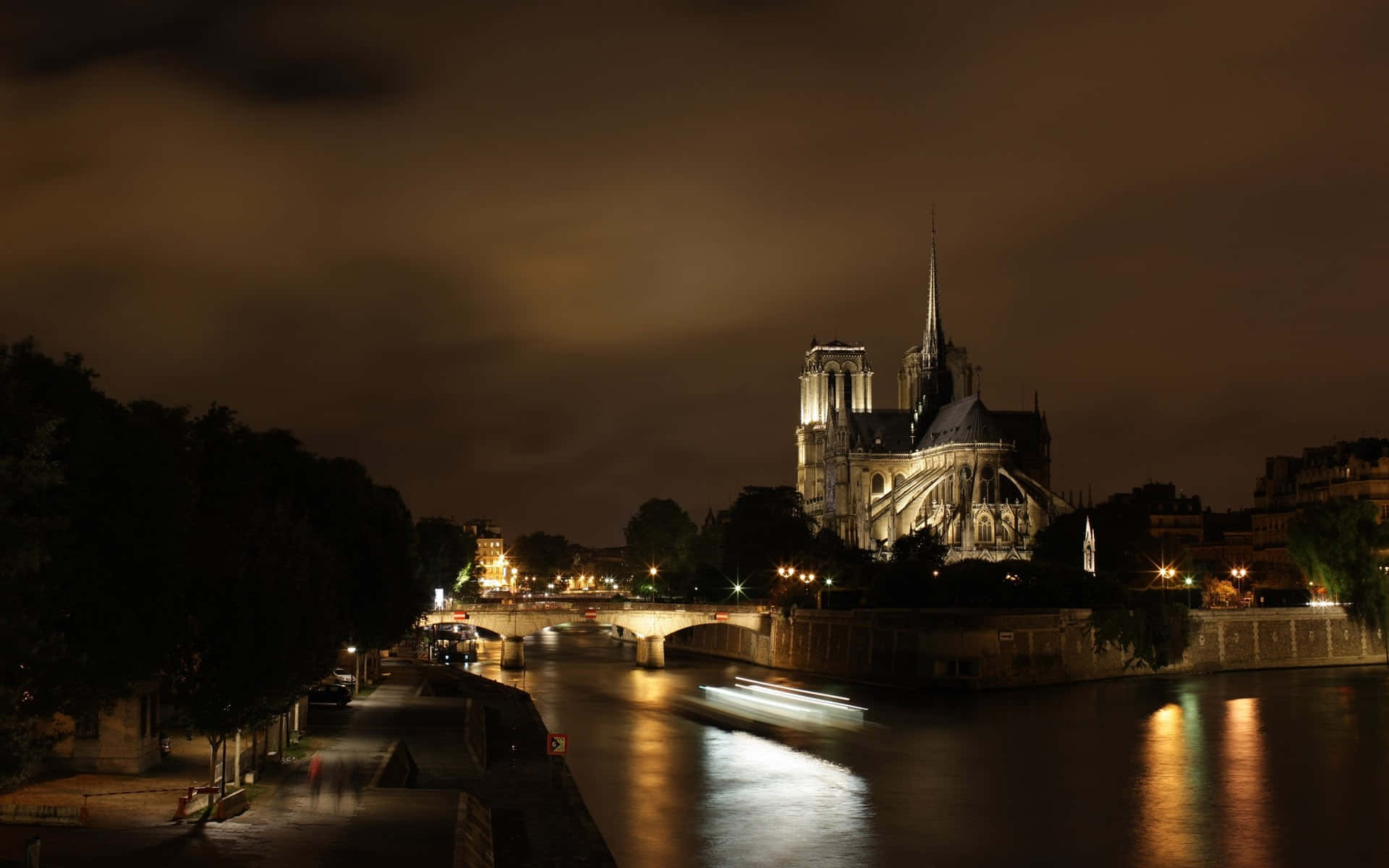 Notre Dame Cathedral With Wide View Of Scenery Wallpaper