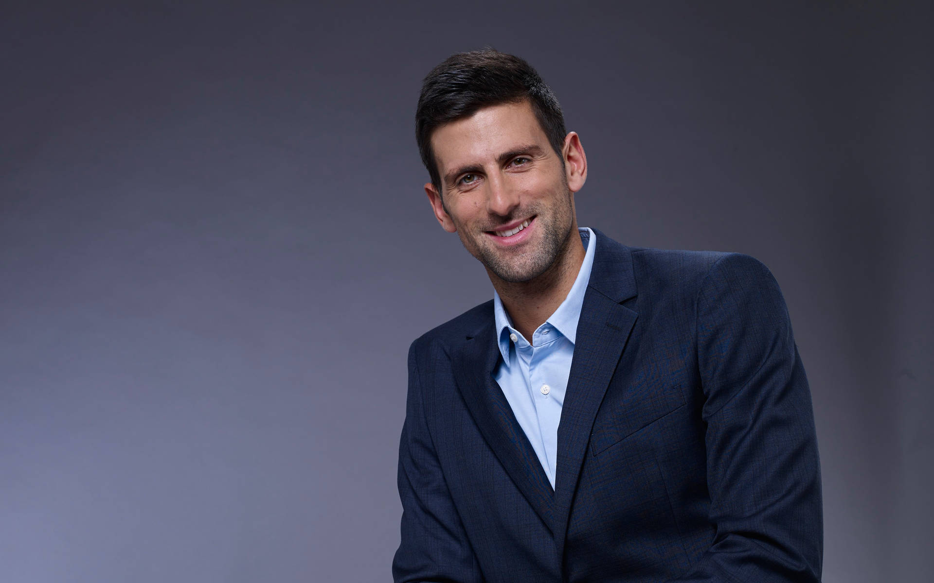 Novak Djokovic Black Suit Background