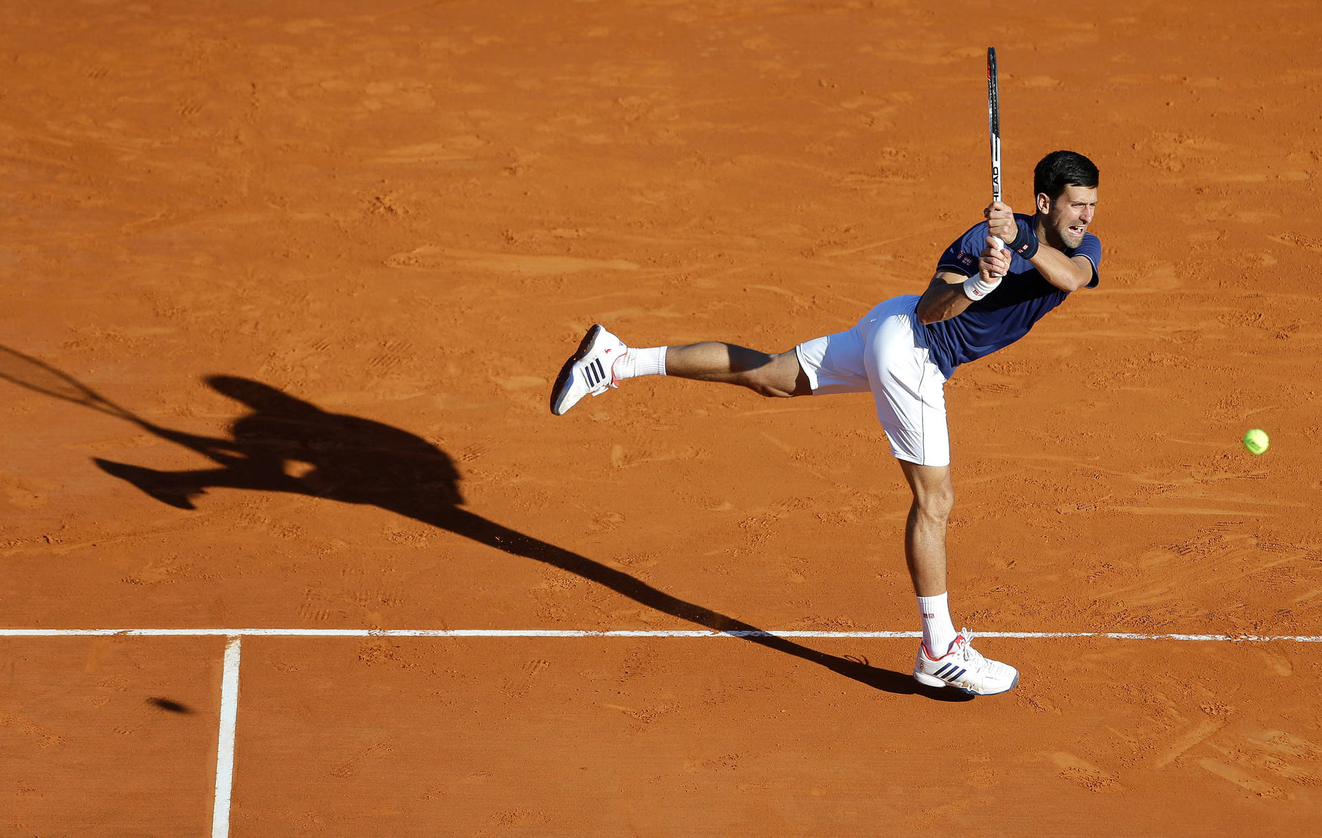 Novak Djokovic Clay Court Match Background