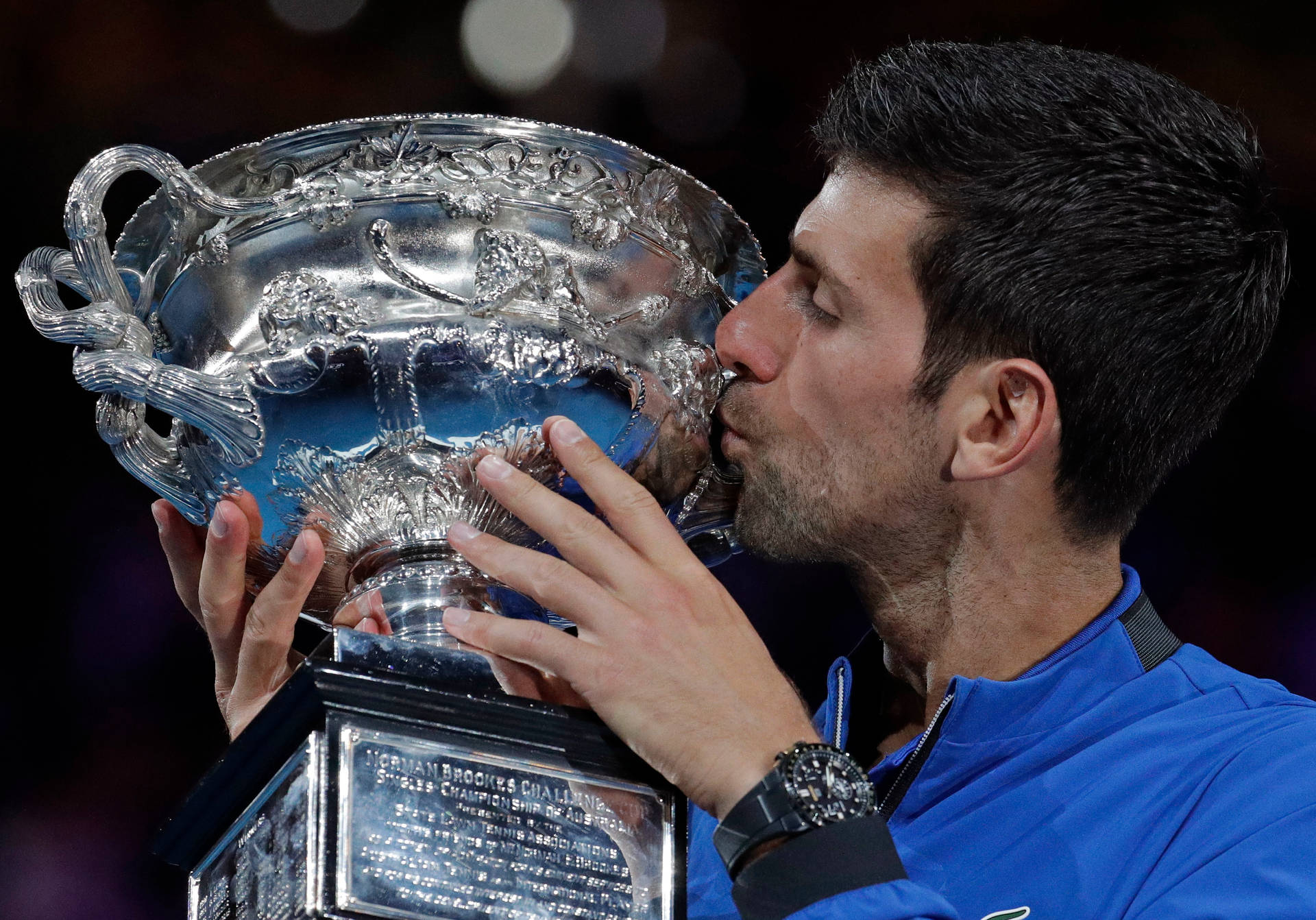 Novak Djokovic With Silver Trophy Wallpaper