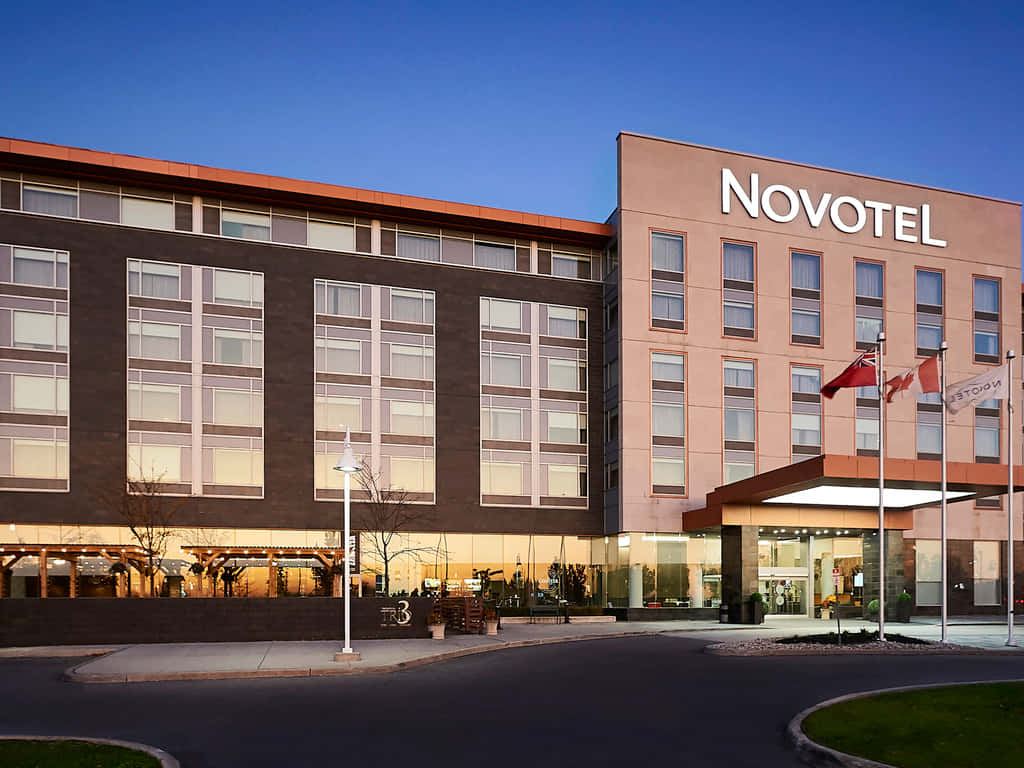 Download Novotel Vaughan Twilight Exterior Wallpaper | Wallpapers.com