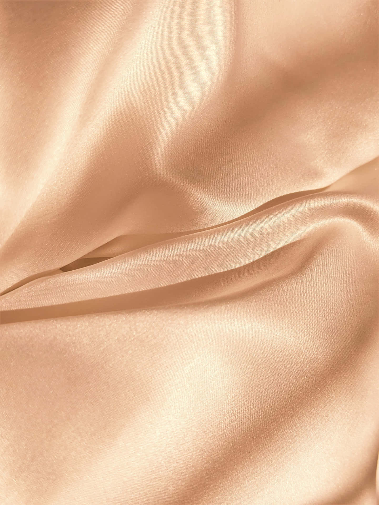 A Close Up Of A Beige Silk Fabric