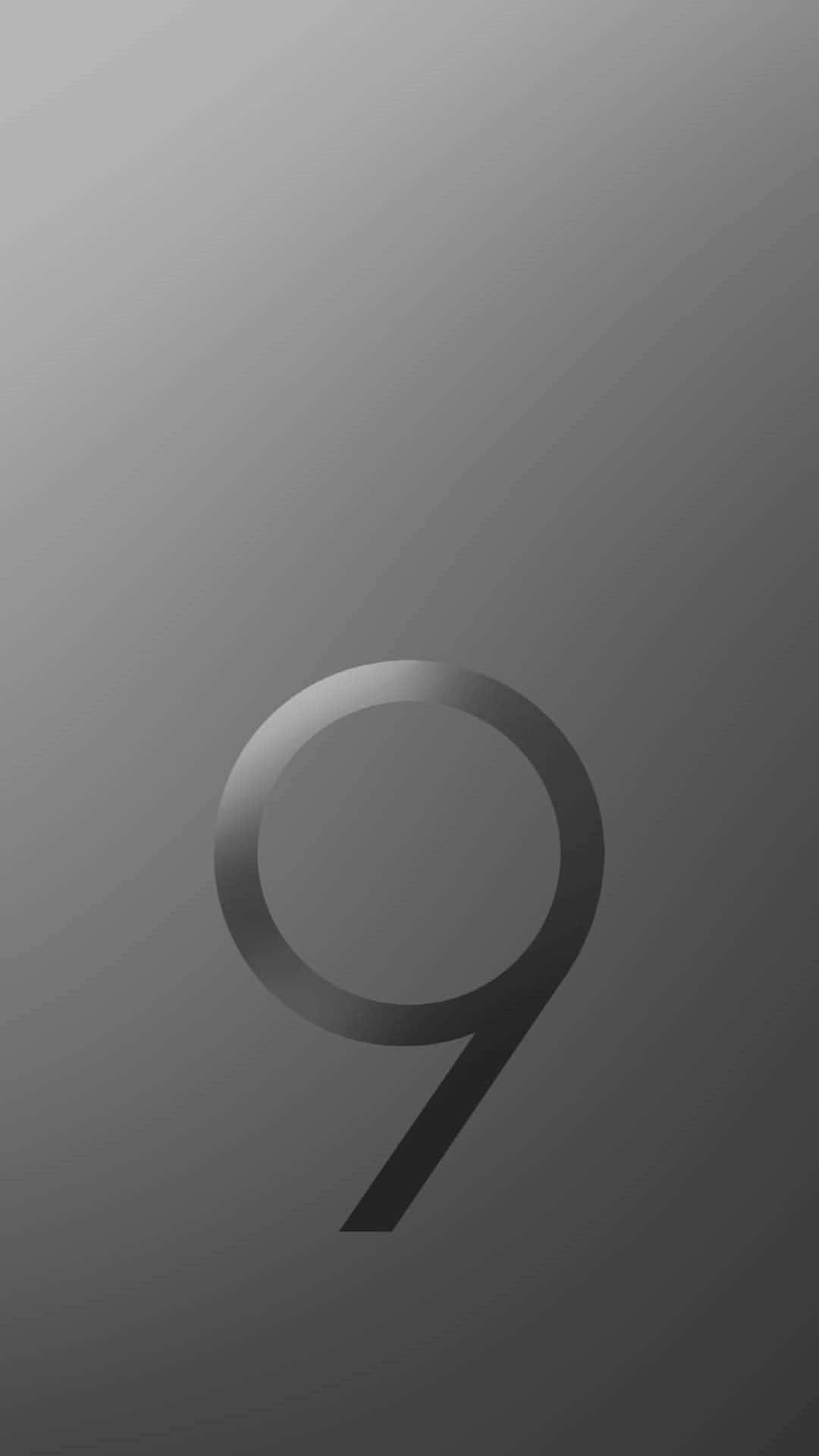 A Black And Gray Background With The Number 9 Wallpaper