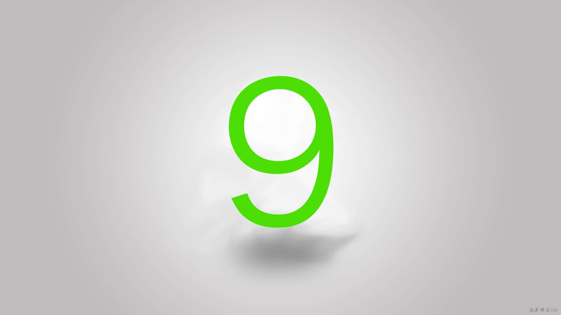 A Green Number 9 On A Gray Background Wallpaper
