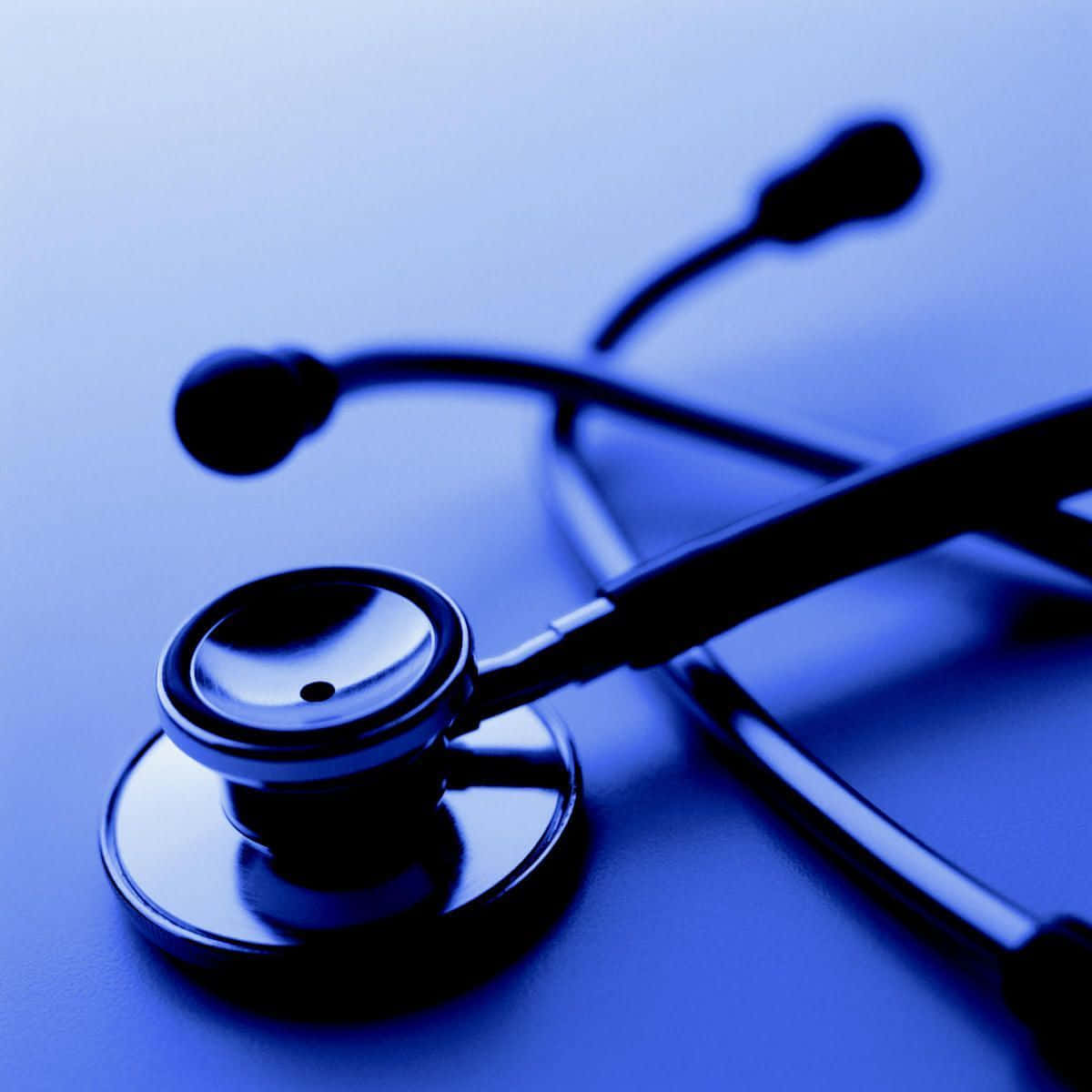 A Stethoscope On A Blue Background