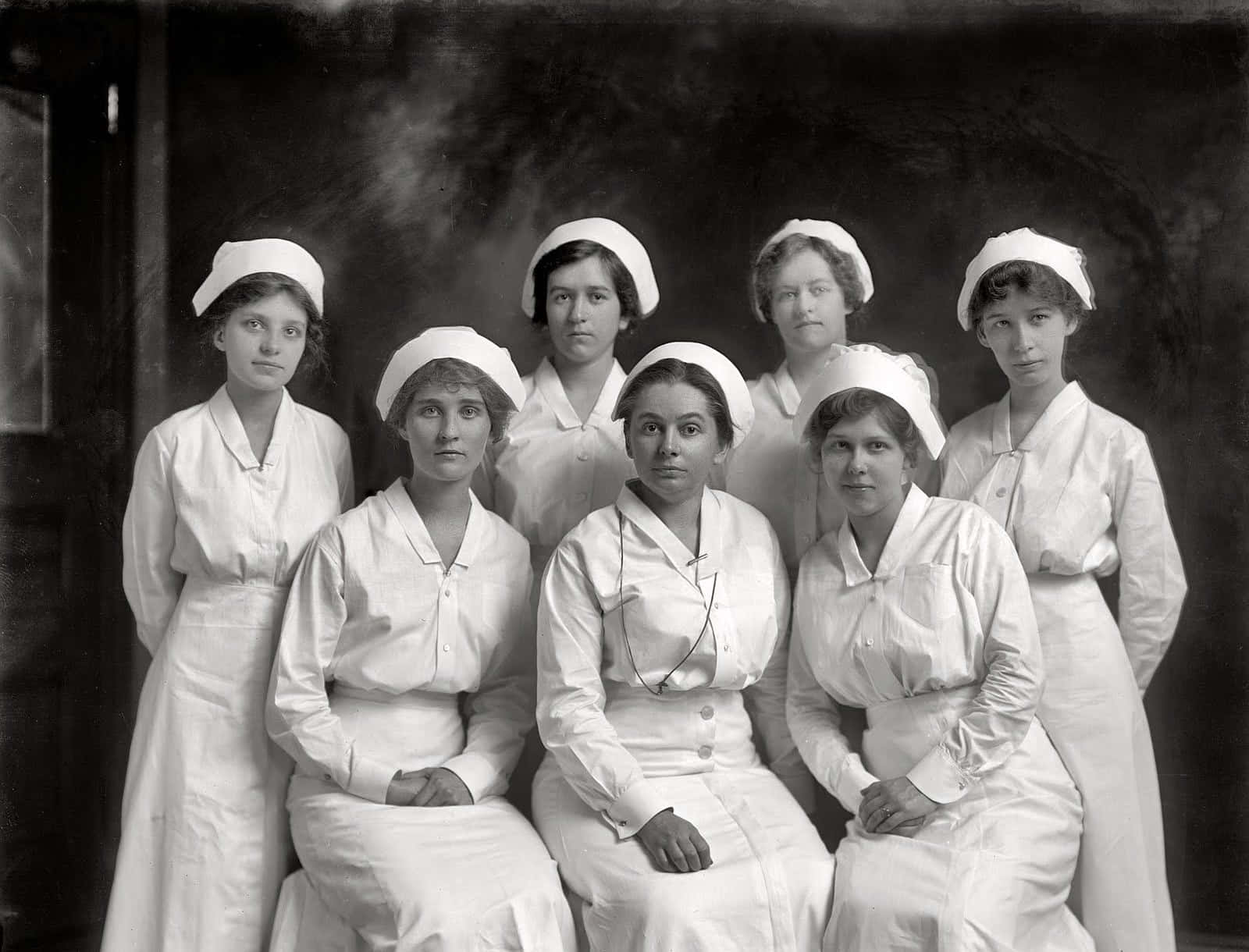 Engrupp Sjuksköterskor Poserar För En Bild