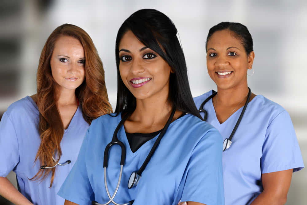 Three Female Nurses Standing Together
