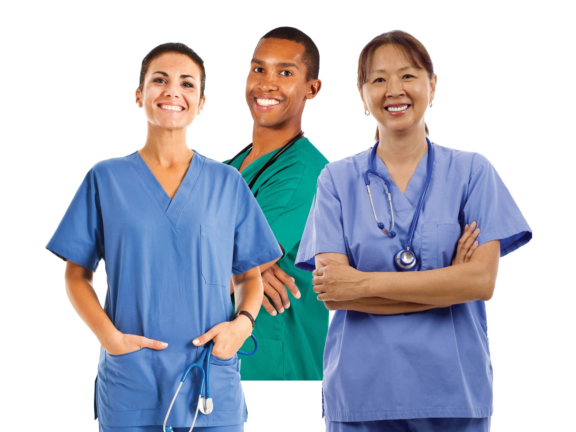 Four Nurses In Scrubs Standing Together