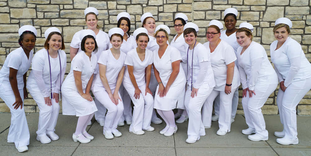 Ungrupo De Enfermeras Posando Para Una Foto