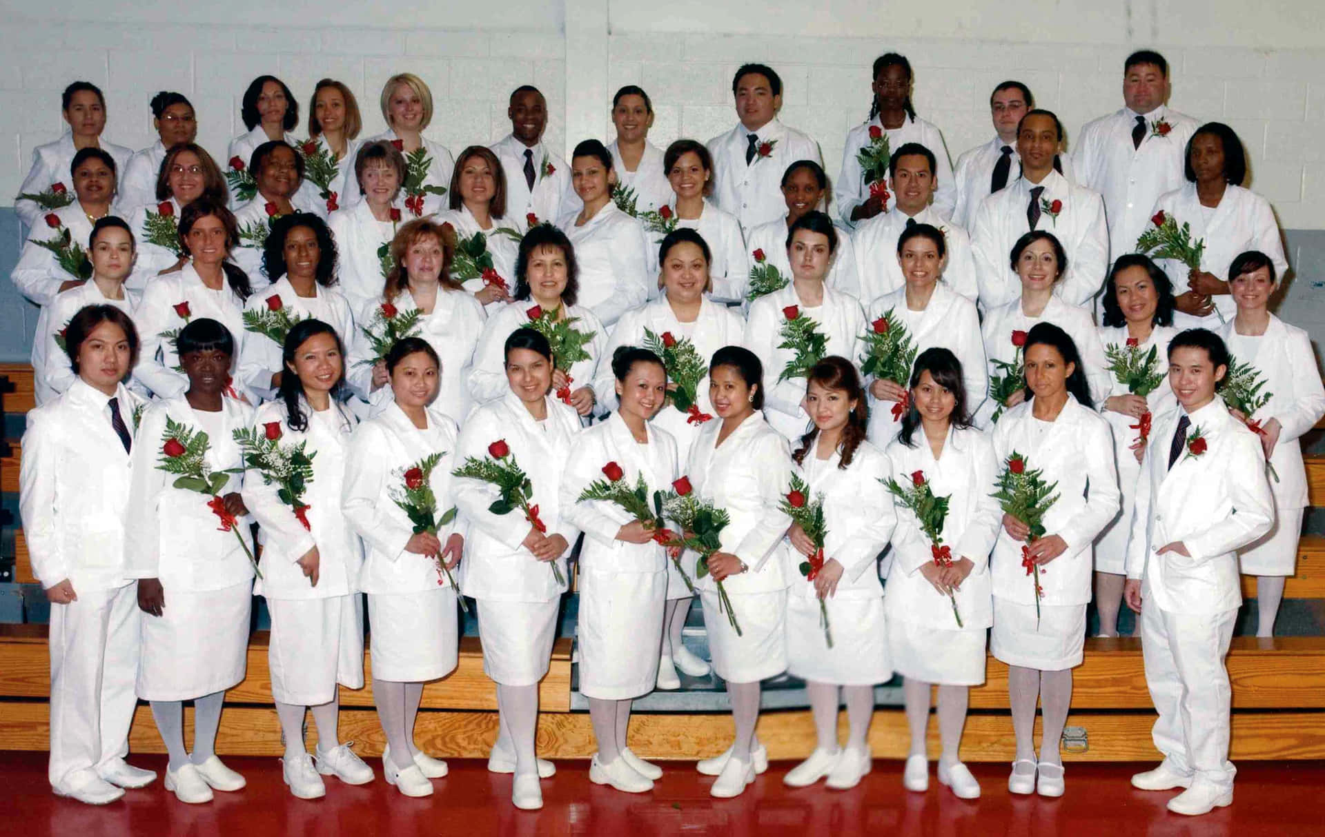 A Group Of Doctors In White Coats Posing For A Picture