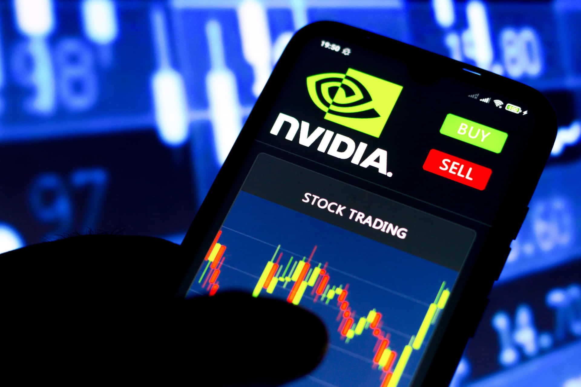 A Person Holding A Phone With A Nvidia Stock Screen