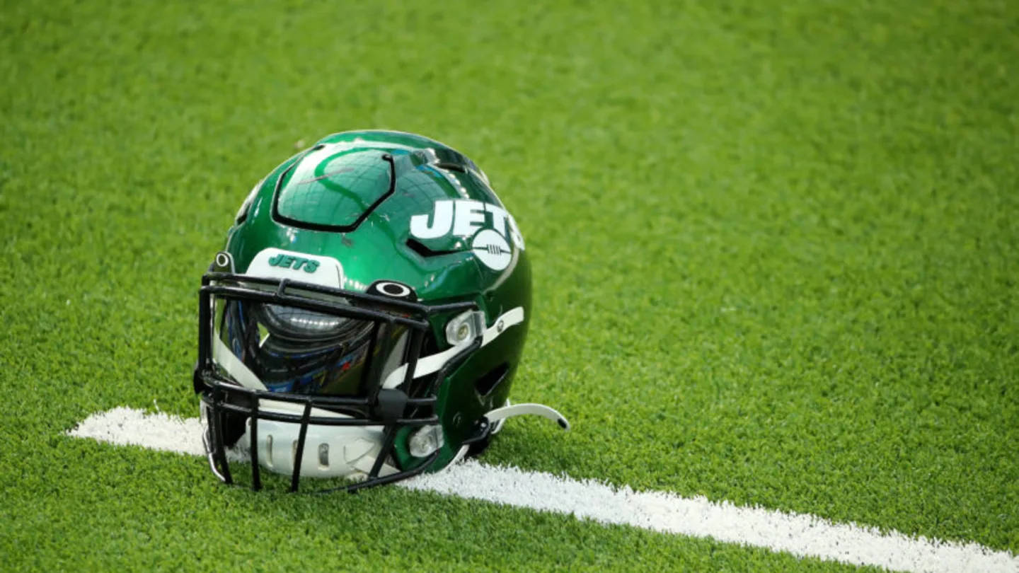 NY Jets Helmet On The Field Wallpaper