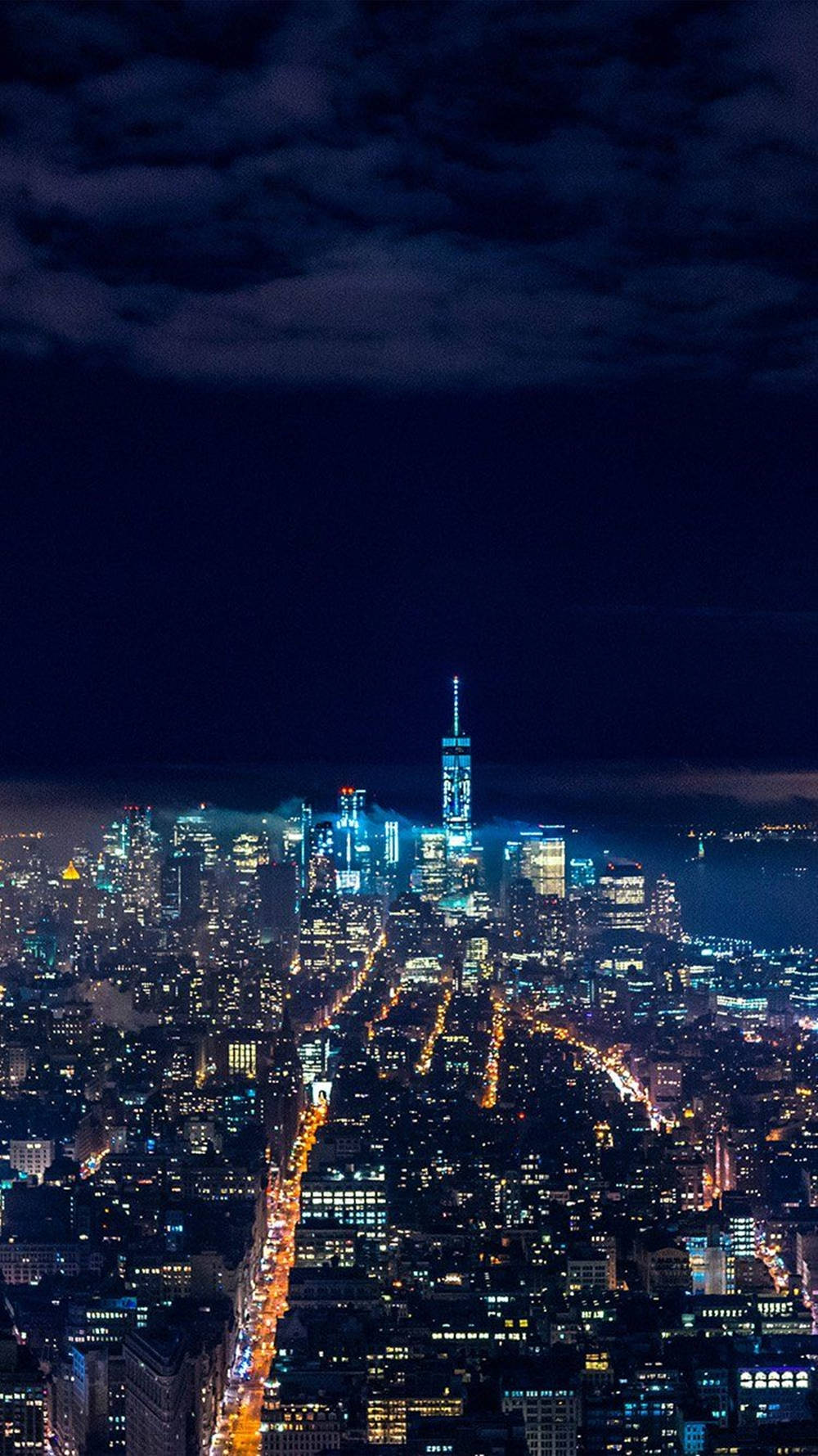 Estéticaimpresionante De Manhattan En La Noche Para Teléfono Móvil. Fondo de pantalla