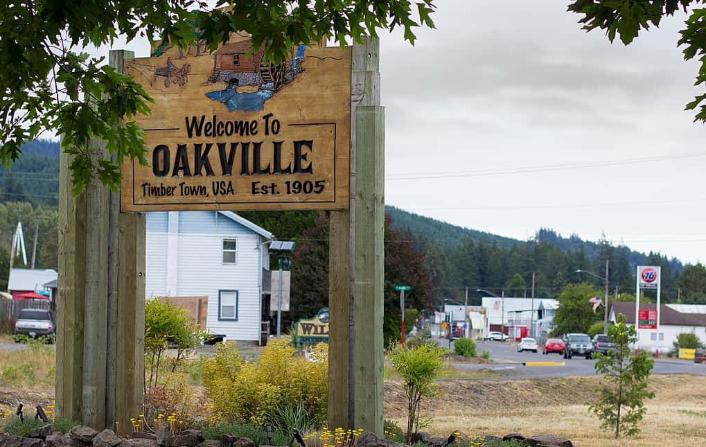 Oakville Velkomstskilt Timber Town Bakgrunnsbildet