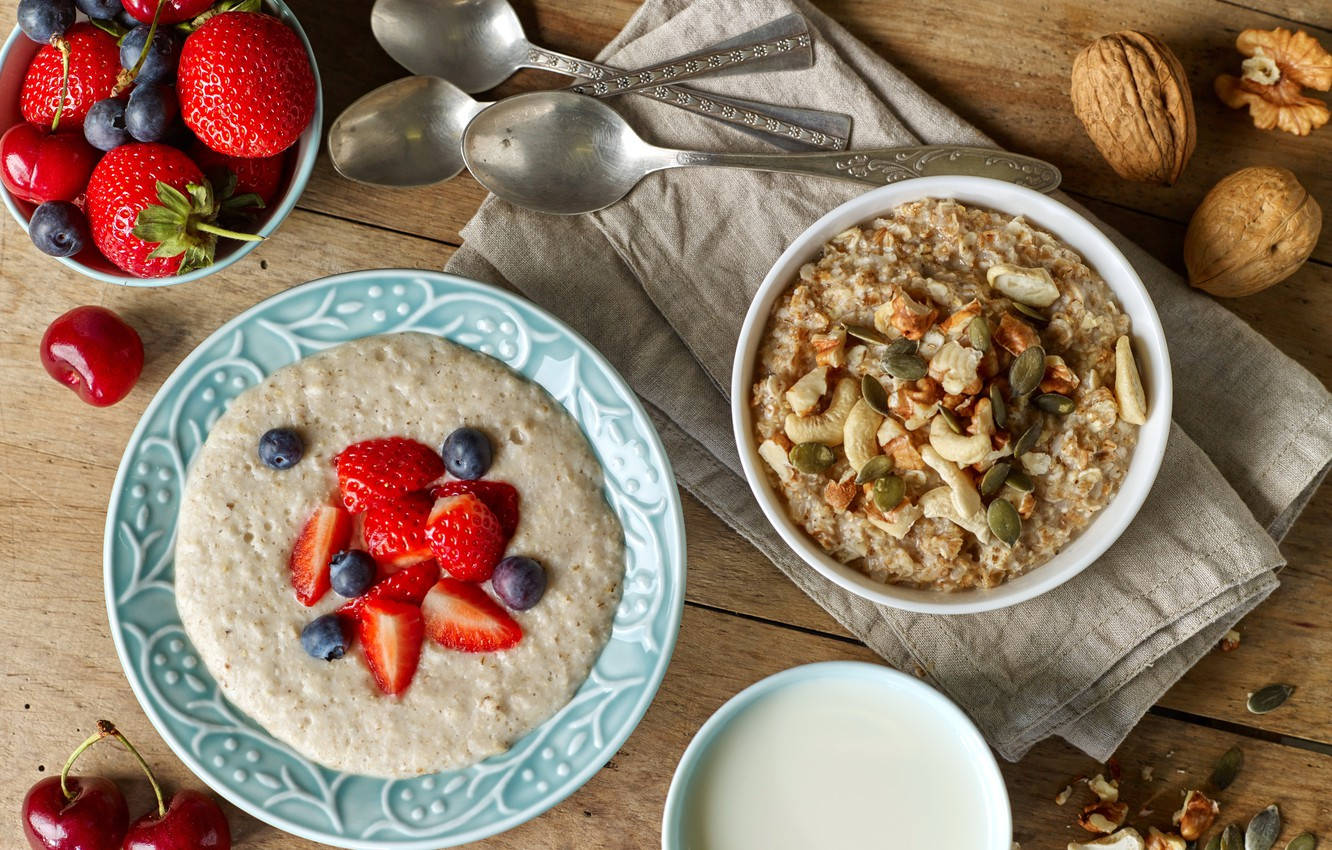 Oatmeal With Pumpkin Seeds And Porridge With Berries Wallpaper