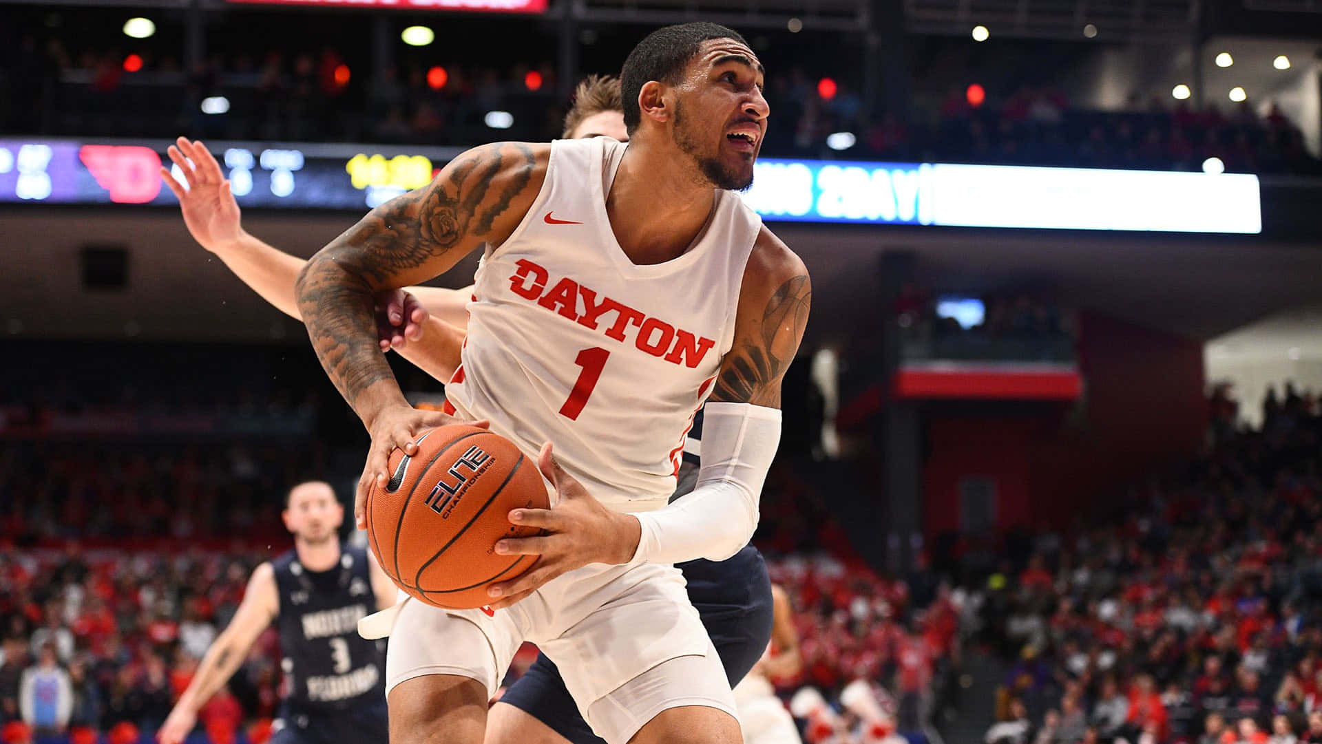 Obi Toppin Dayton Flyers Basketball Action Wallpaper