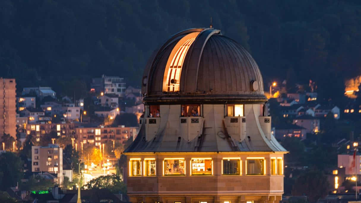 Majestic Observatory under a Starry Night Sky Wallpaper