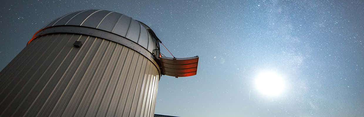 Bijschrift: Majestueus Nachtelijk Observatorium Achtergrond