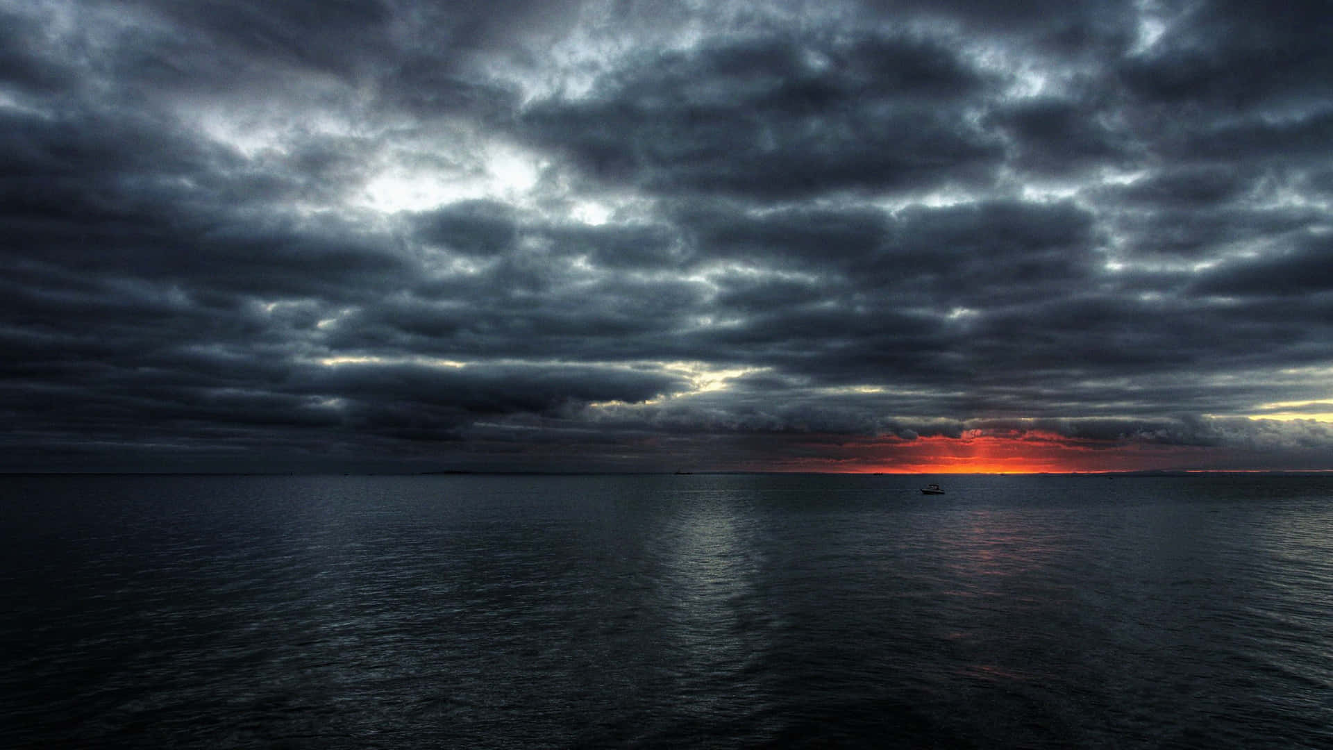 Dark Clouds Ocean 4K iPad Wallpaper