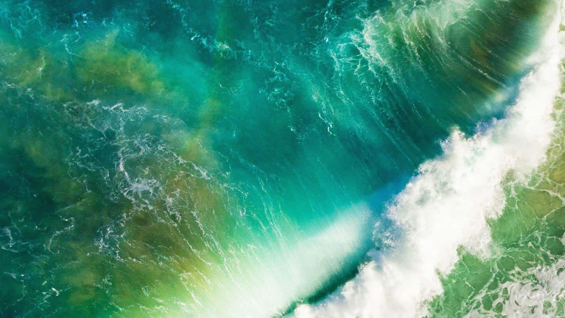 Eineluftaufnahme Einer Grünen Welle Im Ozean Wallpaper