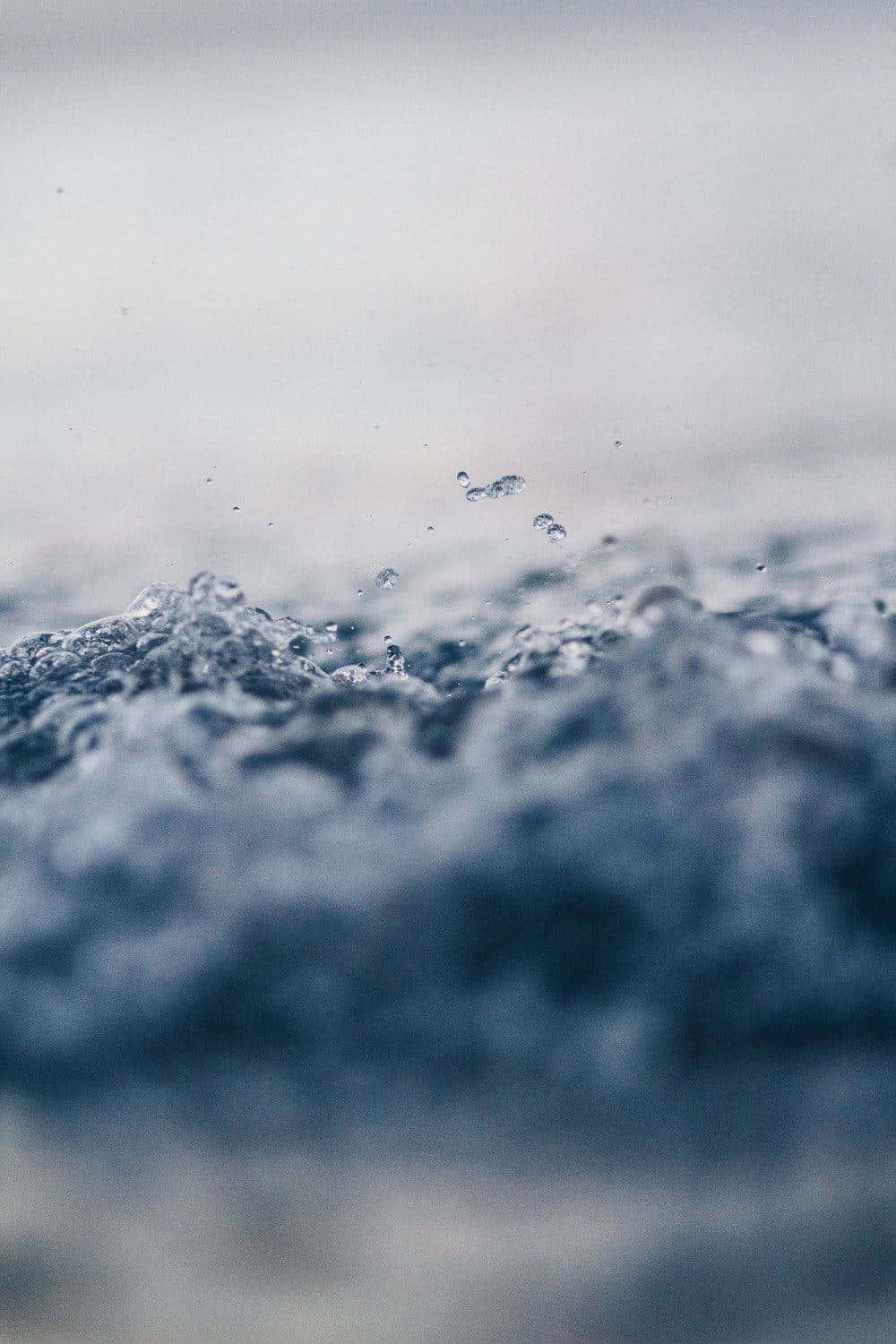 Vand sprøjter på overfladen afhavet Wallpaper