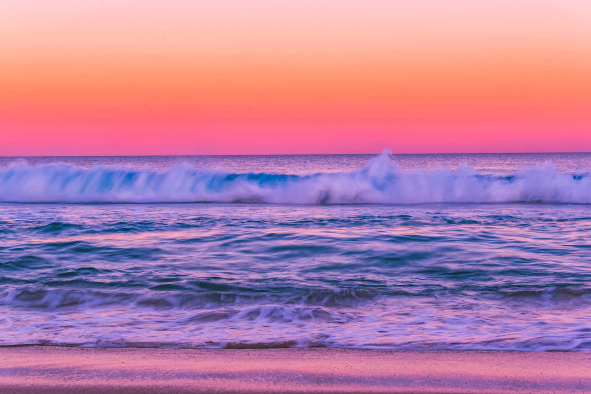 Ocean With Pink Sunset Background