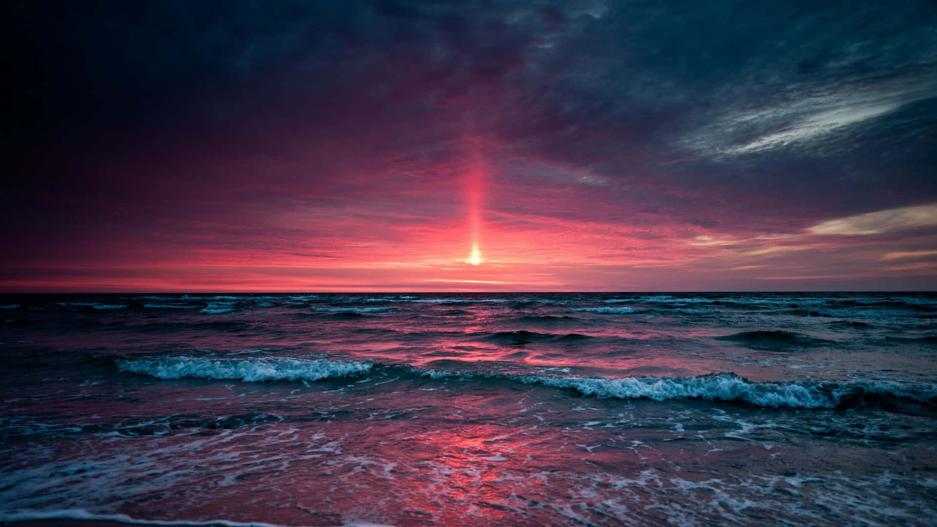 Intriguing view of the sunset over Ocean Beach Wallpaper