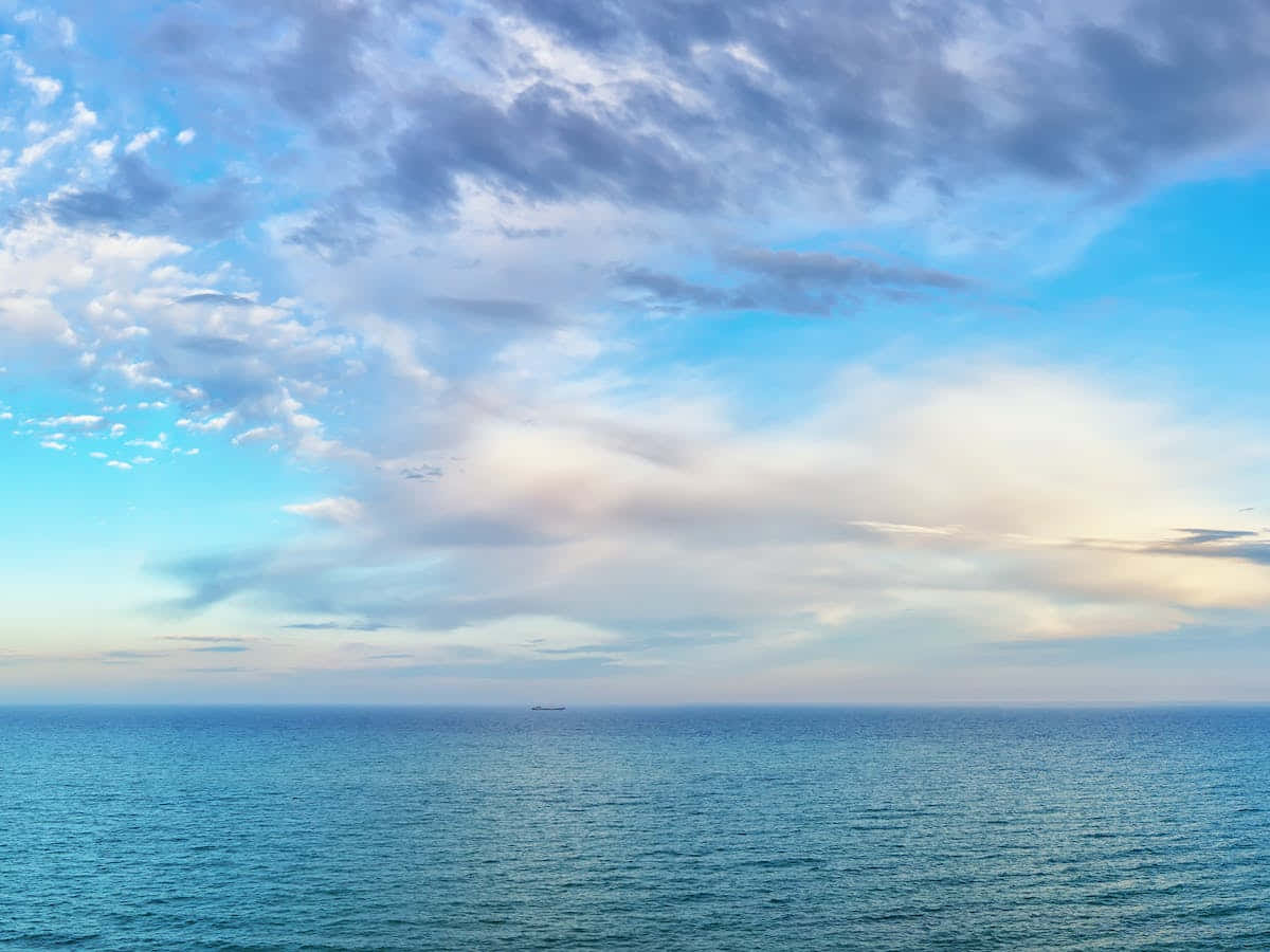 The turquoise-colored water of the ocean remains majestic and mysterious