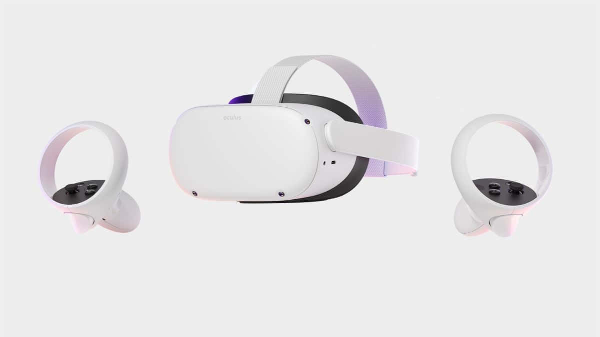 A White Vr Headset With Headphones And Earphones