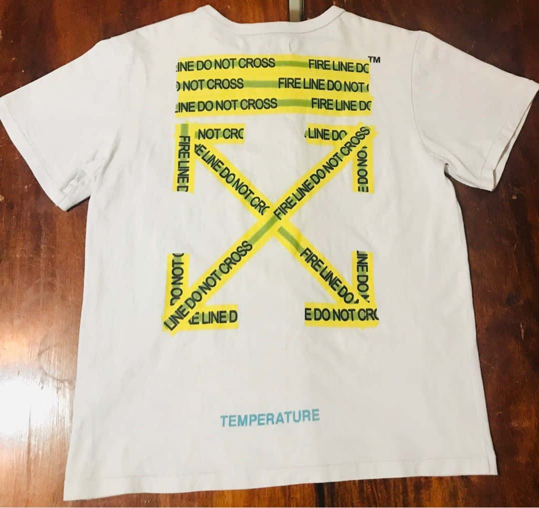 A White T - Shirt With A Yellow Tape On It
