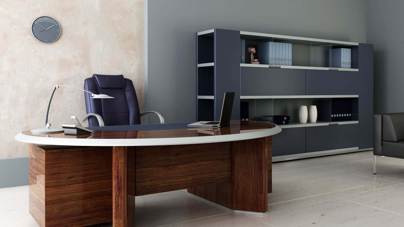 A Modern Office With A Desk, Chair And A Bookcase