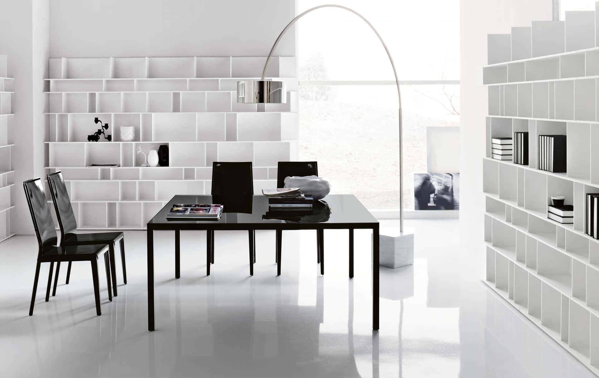A White And Black Office With Bookshelves