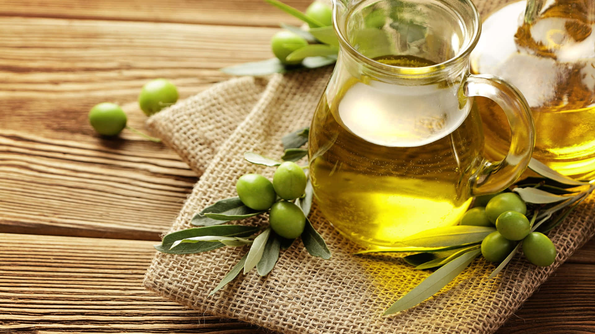 Olivenölund Olivenblätter Auf Einem Holztisch