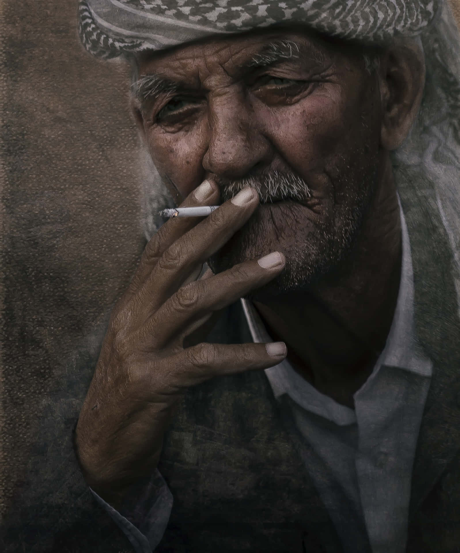 Old Arab Man Smoking Cigarette Wallpaper