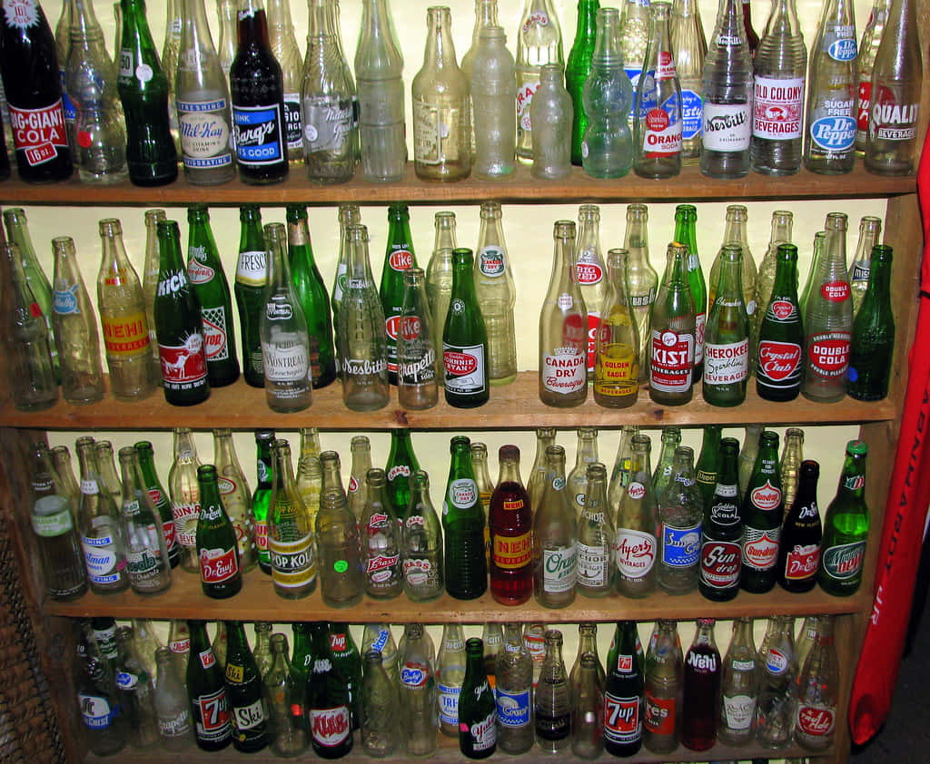 An old wine cellar stocked with a variety of dusty bottles