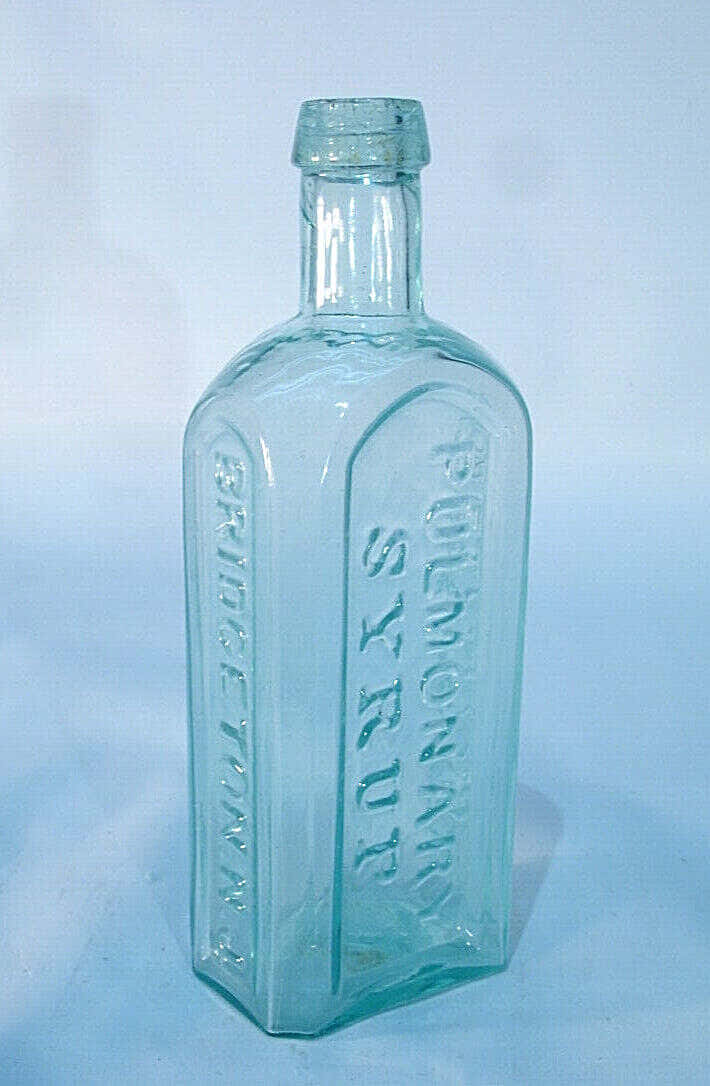 Nostalgic Display of Antique Glass Bottles