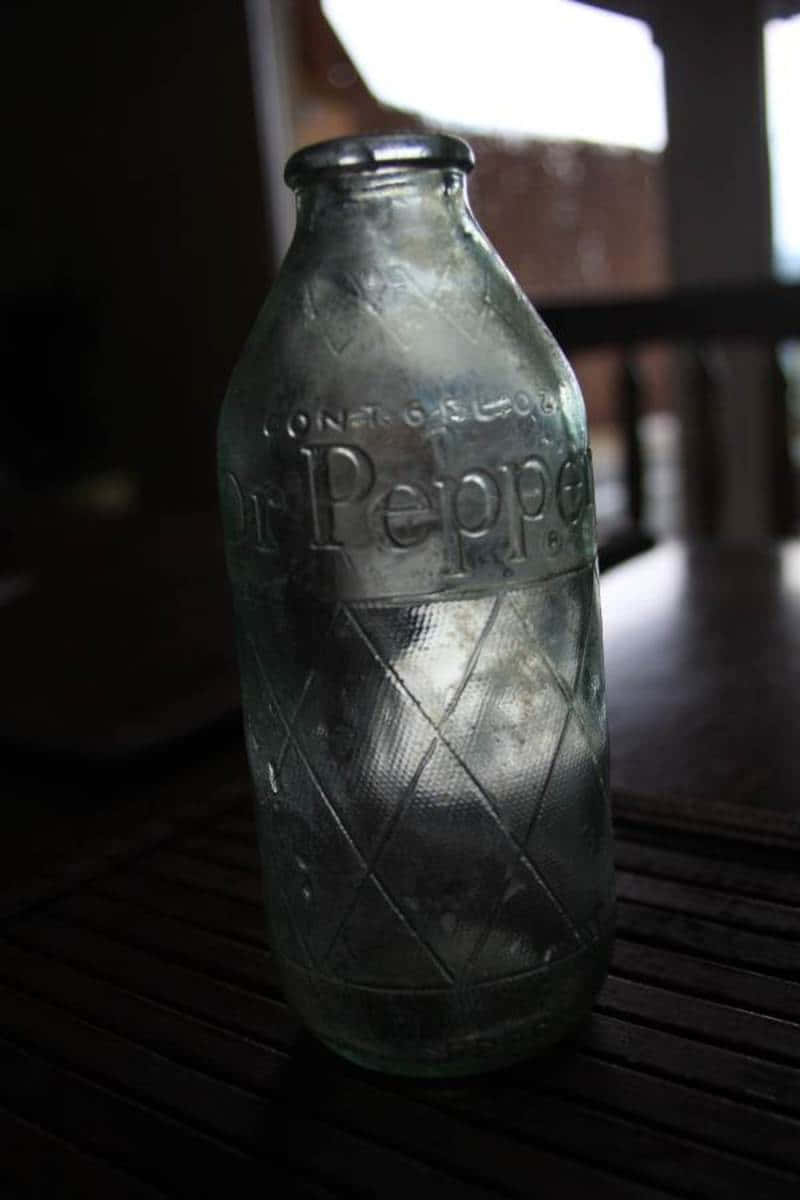 A Glass Bottle On A Table