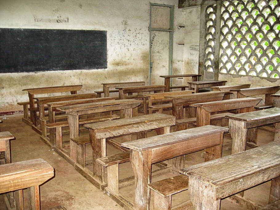 Old Classroom With Empty Chairs In Macaroon Wallpaper