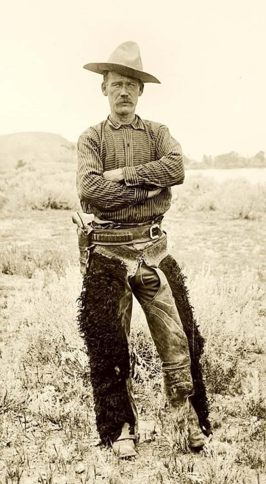 Vecchiafoto Di Un Cowboy In Un Campo