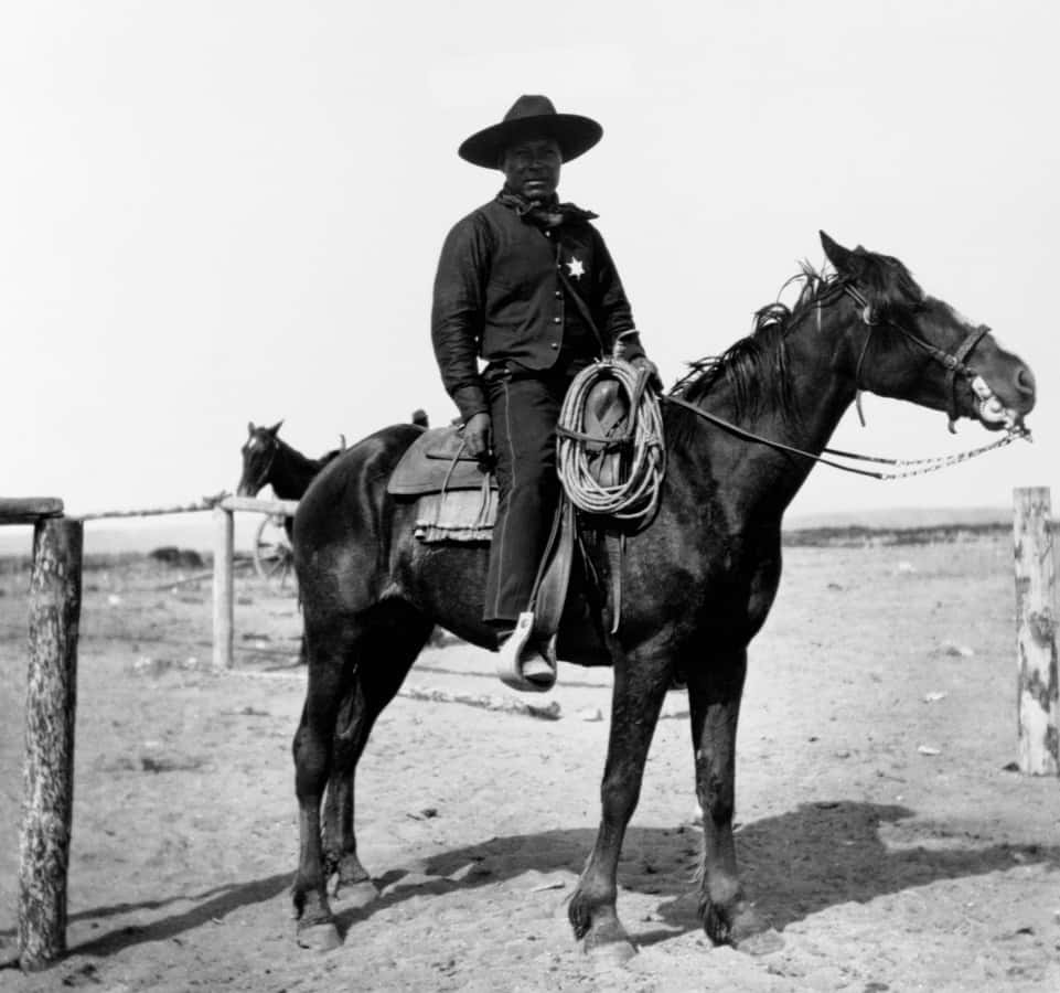 Old Cowboy Sheriff Riding Horse Picture